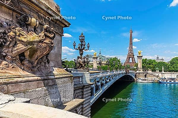 Close view of Alexandre III Bridge with sculptures over Seine river, Paris, France [IBR125261635]