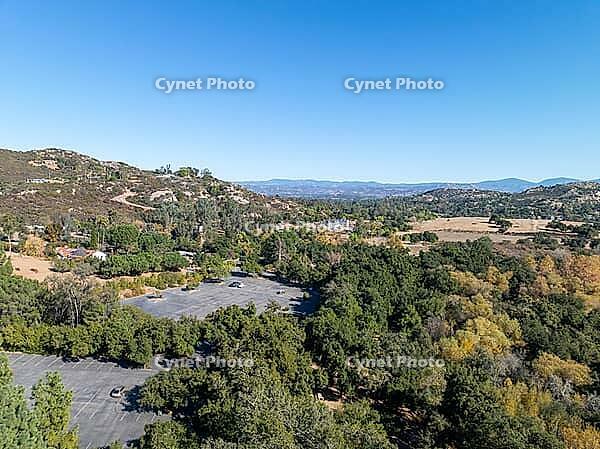 Aerial view of Campsites in the valley of Dos Picos County Park in Ramona, South California, USA [IBR125280325]