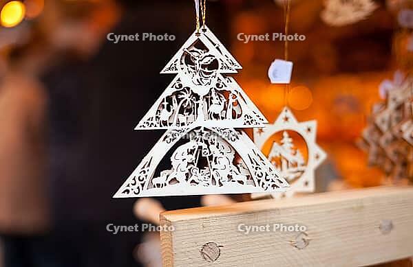 Wooden Decoration for sale in Christmas market, Munich [IBR125280333]