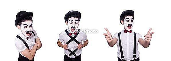 The personification of Charlie Chaplin on white [IBR125304597]