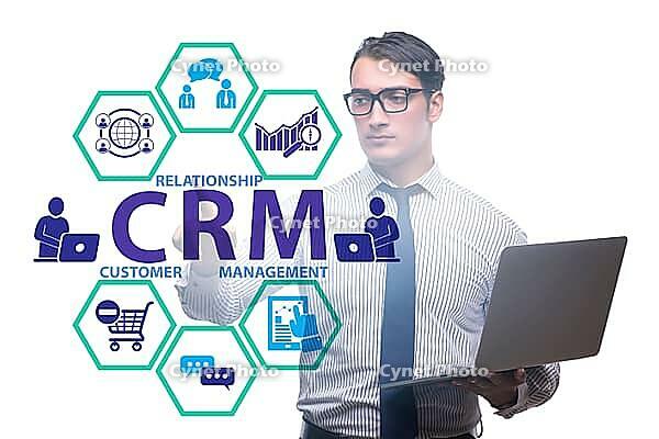 CRM concept for customer relationship management with the businessman [IBR125324089]