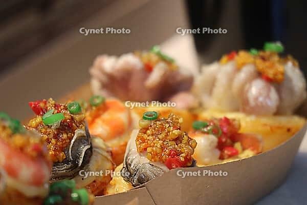 Guangzhou chinese street food made with eggs and seafood [IBR125324127]