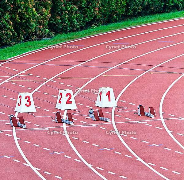 Lanes one through 3 equiped with starting blocks for the 100m dash [IBR125324145]