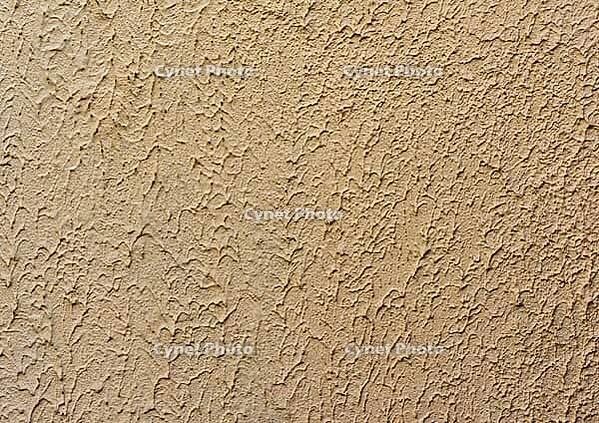 Fragment of beige wall with decorative plaster of waves, full frame [IBR125344320]