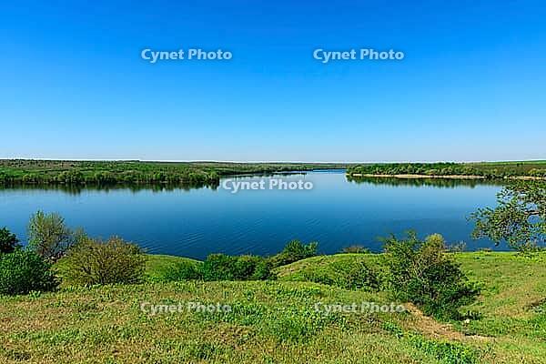 View at the mouth of the Kamenka River near the village of Respublikanets, Kherson region, a spring sunny day [IBR125344326]