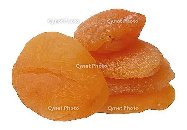 Stack of dried apricots on isolated background, close up [IBR125363556]