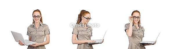 Businesswoman using laptop against white background [IBR125363604]