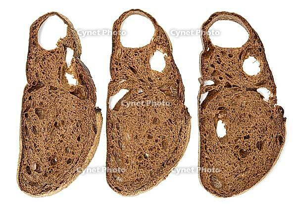 Sliced bread made from rye flour isolated on white background, top view [IBR125382561]