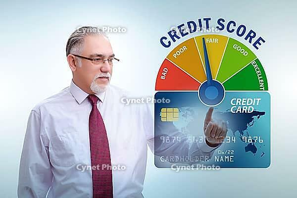 The businessman in the credit score concept [IBR125382596]