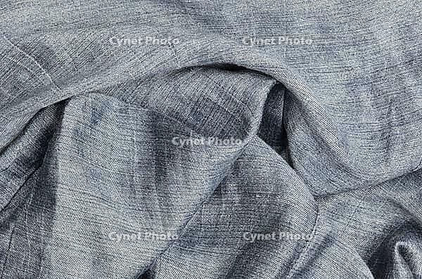 Close up gray crumpled linen background [IBR125382640]