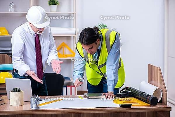 Two architects are working on the project [IBR125382653]
