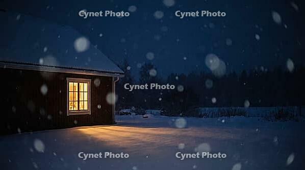 Warm Glowing Window of a Country House in a Snowy Yard at Winter Night with Falling Snow Bokeh, Background with Copy Space, AI generated [IBR125395937]