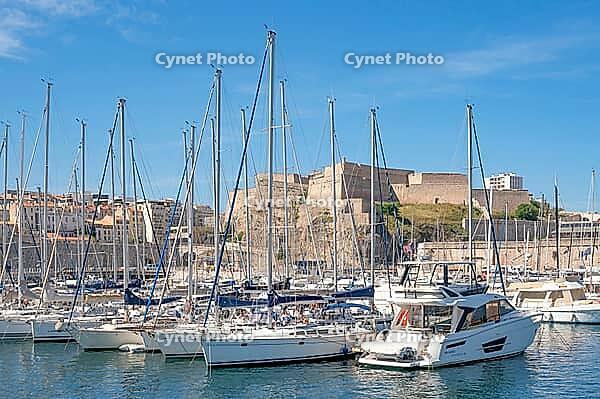 View of the historic fortifications of Fort Saint-Nicolas on the southern side of the port entrance to the Old Port, dominated by walls and green spaces opposite the city center, Marseille, Bouches-du-Rhone, Provence, Provence-Alpes-Cote d'Azur, France [IBR125405017]
