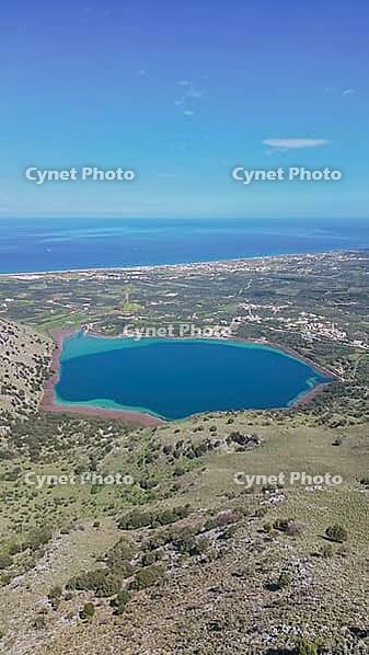 Aerial view of Lake Kournas in Crete and Cretan Sea, panoramic landscape of Greek island nature and mountain horizon [IBR125405070]