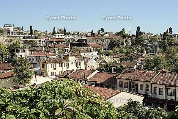 Antalya, Turkey, October 15, 2025. the old center of Antalya, the port of Kaleici in Antalya. Roofs of houses, old bricks. Touristic historic place in Antalya, Turkey. Tourism to European historic sites [IBR125411076]
