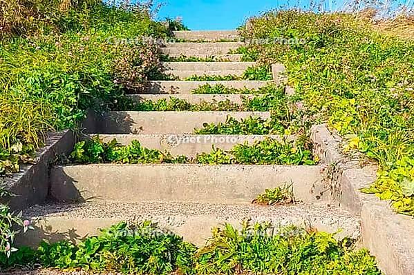 Concrete staircase leading up the hill to the memorial. Sakhalin, Russia [IBR125411093]