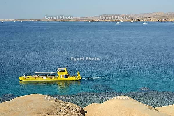Sharm El Sheikh, Egypt March 12, 2025: Bathyscaphe pleasure boat with tourists on a trip to the Red Sea [IBR125411095]
