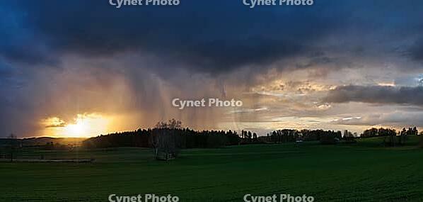 Sunset in a thunderstorm [IBR125411137]