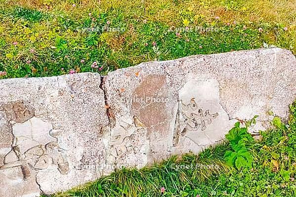 Japanese characters on a granite stone at a memorial in memory of those who died in the war. Japanese characters on monuments from the imperial era before World War II. Sakhalin, Russia [IBR125411156]