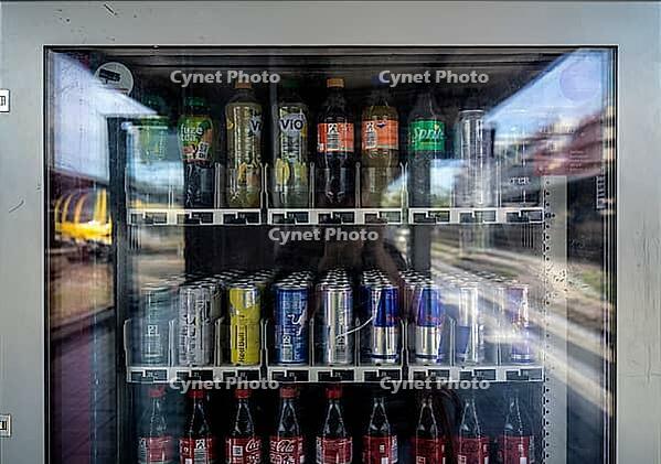 Reflection, vending machine for soda, soft drinks, sugary, bottles and cans, Fanta, Coca-Cola, Sprite, Red Bull, energy drinks, Bad Cannstatt train station, Stuttgart, Baden-Württemberg, Germany [IBR113394888]