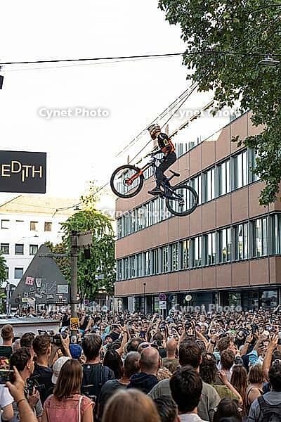 05 September 2026, a mountain bike rider jumps high above spectators at the Red Bull Cerro Abajo urban downhill race in Stuttgart, Germany [IBR113394902]