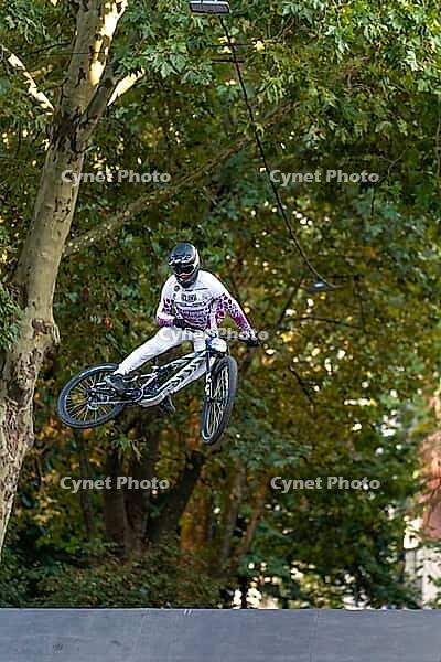 05 September 2026, A cyclist jumps mid-air during the Red Bull Cerro Abajo urban downhill race in Stuttgart, Germany [IBR113394911]