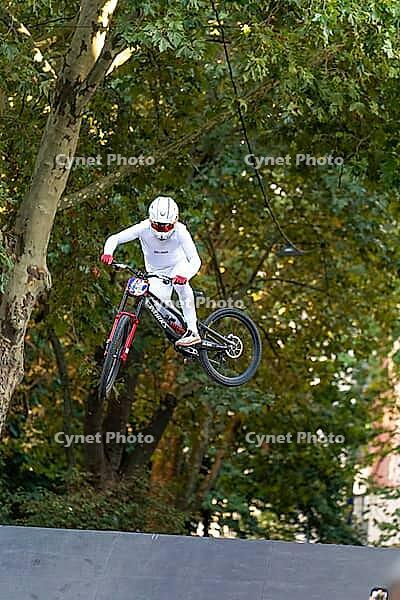 05 September 2026, A cyclist jumps mid-air during the Red Bull Cerro Abajo urban downhill race in Stuttgart, Germany [IBR113394912]