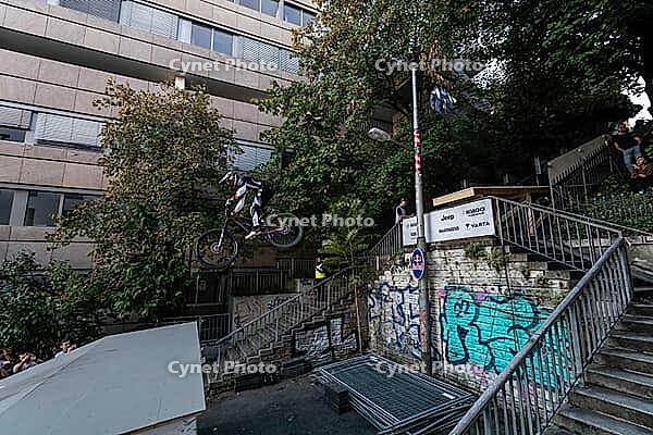 05 September 2026, A mountain biker catches air off a wooden ramp during Red Bull Cerro Abajo in Stuttgart, Germany [IBR113394914]