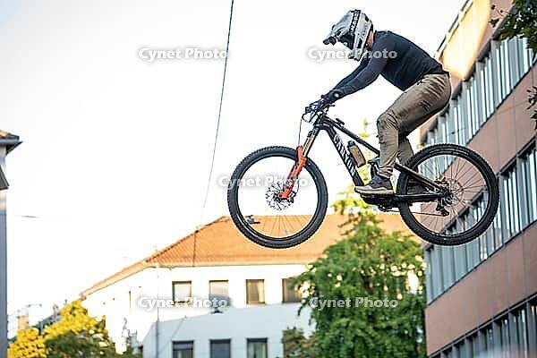 05 September 2026, a mountain biker leaps through the air during the Red Bull Stuttgart Cerro Abajo urban downhill race in Stuttgart, Germany [IBR113394915]