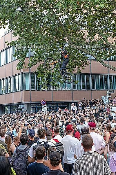 05 September 2026, a mountain bike rider jumps high above spectators at the Red Bull Cerro Abajo urban downhill race in Stuttgart, Germany [IBR113394919]