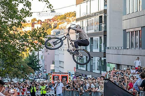 05 September 2026, A rider jumps mid-air during the Red Bull Cerro Abajo urban downhill mountain bike race in Stuttgart, Germany [IBR113394920]