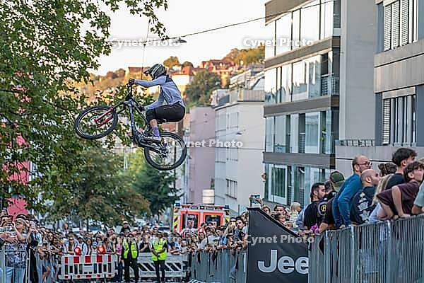 05 September 2026, A rider jumps mid-air during the Red Bull Cerro Abajo urban downhill mountain bike race in Stuttgart, Germany [IBR113394921]