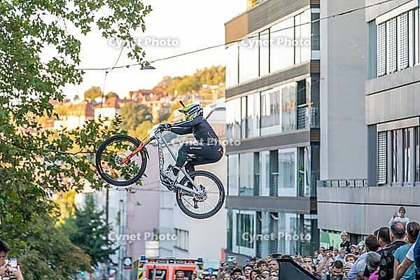 05 September 2026, A rider jumps mid-air during the Red Bull Cerro Abajo urban downhill mountain bike race in Stuttgart, Germany [IBR113394923]
