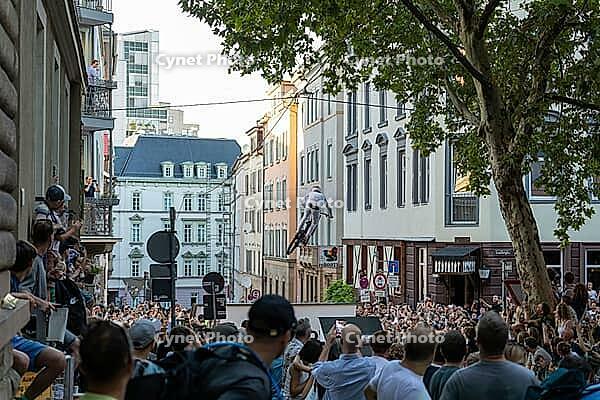 05 September 2026, A mountain bike rider jumps over an urban obstacle during Red Bull Cerro Abajo in Stuttgart, Germany [IBR113394924]