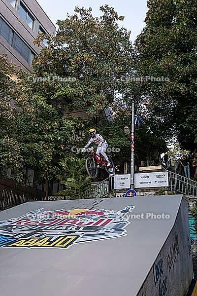 05 September 2026, A mountain biker catches air off a wooden ramp during Red Bull Cerro Abajo in Stuttgart, Germany [IBR113394925]
