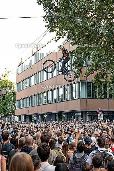 05 September 2026, a mountain bike rider jumps high above spectators at the Red Bull Cerro Abajo urban downhill race in Stuttgart, Germany [IBR113394926]