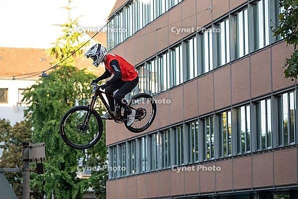 05 September 2026, Mountain bike riders jump over a crowd during the Red Bull Cerro Abajo urban downhill event in Stuttgart, Germany [IBR113394931]