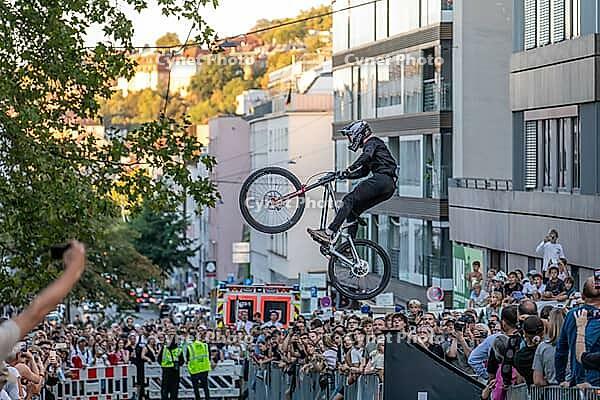 05 September 2026, A rider jumps mid-air during the Red Bull Cerro Abajo urban downhill mountain bike race in Stuttgart, Germany [IBR113394932]