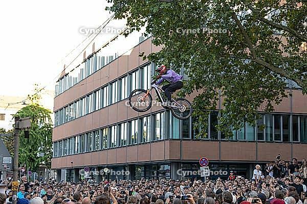 05 September 2026, Mountain bike riders jump over a crowd during the Red Bull Cerro Abajo urban downhill event in Stuttgart, Germany [IBR113394938]