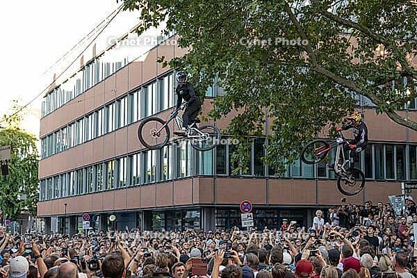 05 September 2026, Mountain bike riders jump over a crowd during the Red Bull Cerro Abajo urban downhill event in Stuttgart, Germany [IBR113394939]