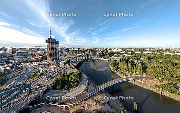 Panoramic view of the Entenwerder Bridge across the Norderelbe with Elbe bridges and Elbe Tower construction site in front of Hamburg city skyline, Hamburg, Germany [IBR113394941]