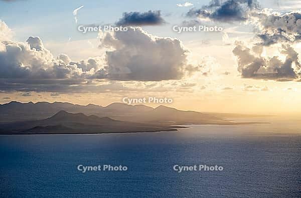 Sea and coast at sunset, Mirador del Porrito viewpoint, Lanzarote, Canary Islands, Spain [IBR125414235]