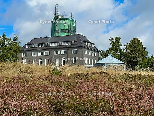 View of the Astenturm complex on Kahler Asten, situated 841 metres above sea level, featuring a 21-metre-high observation tower, the official weather station of the German Weather Service (DWD) and the main building, which houses a hotel, restaurant and p [IBR125414240]