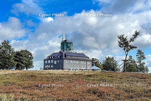 View of the Astenturm complex on Kahler Asten, situated 841 metres above sea level (NN), featuring a 21-metre-high observation tower with an official weather station operated by the German Weather Service (DWD) and a main building housing a hotel, restaur [IBR125414241]