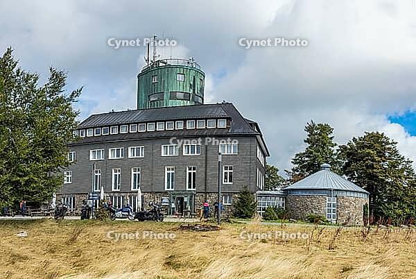 View of the Astenturm complex on the Kahler Asten, situated 841 metres above sea level, featuring a 21-metre-high observation tower, the official weather station of the German Weather Service (DWD) and the main building, comprising a hotel, restaurant and [IBR125414280]
