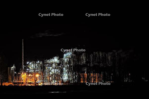 A photo of a factory at night, Lodi, Italy [IBR125415360]