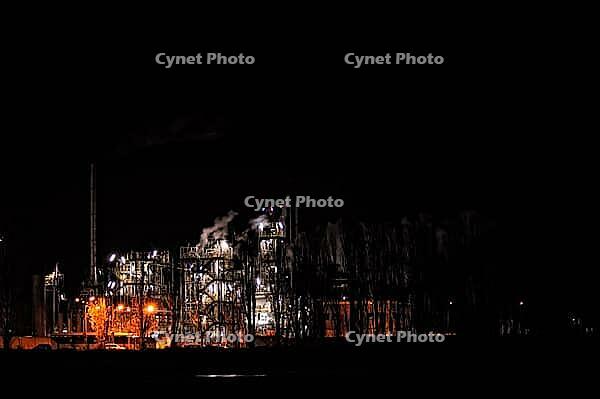 A photo of a factory at night, Lodi, Italy [IBR125415367]