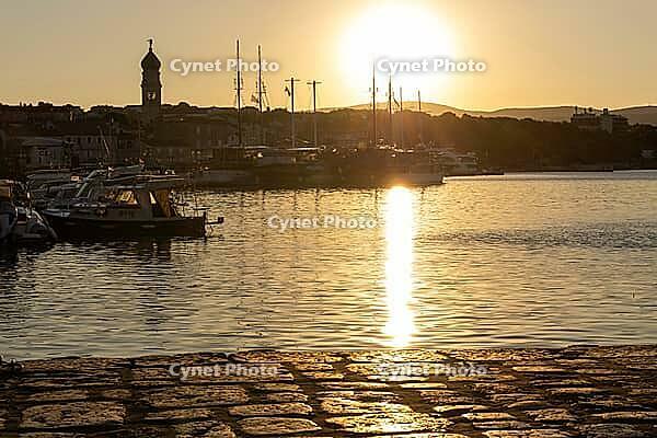 Sunrise over the port of Krk, old town of Krk, island of Krk, Croatia [IBR125415374]