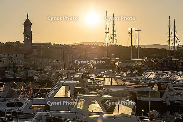 Sunrise over the port of Krk, old town of Krk, island of Krk, Croatia [IBR125415395]