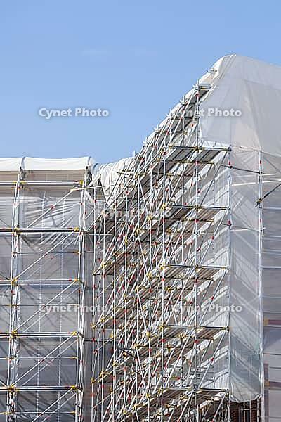 Scaffolding on a large construction site at an office building, Bremen, Germany [IBR125415402]